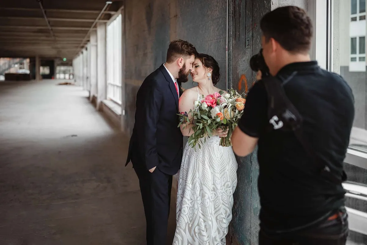 Doug photographing a wedding couple.
