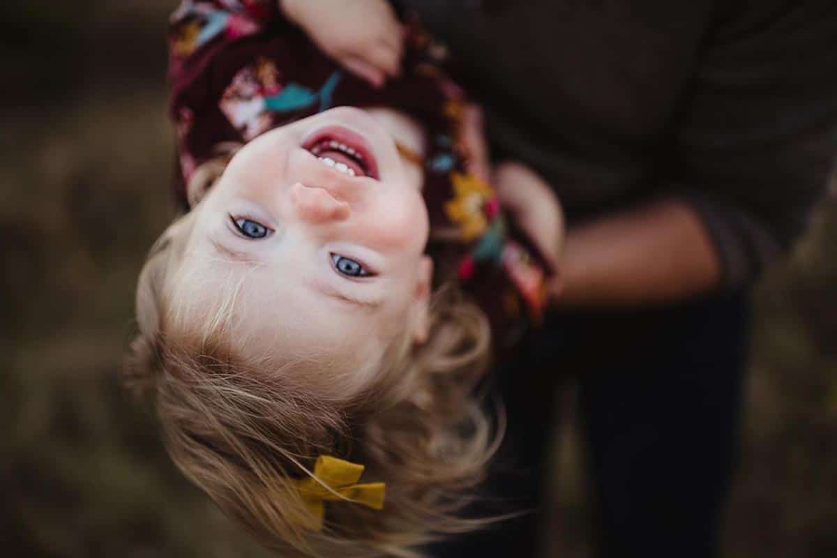 Close Up Upside Down Little Girl