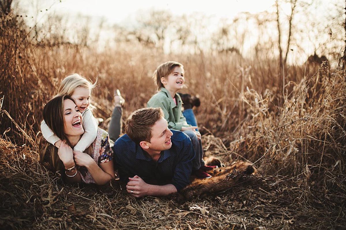 Family in Field Laughing