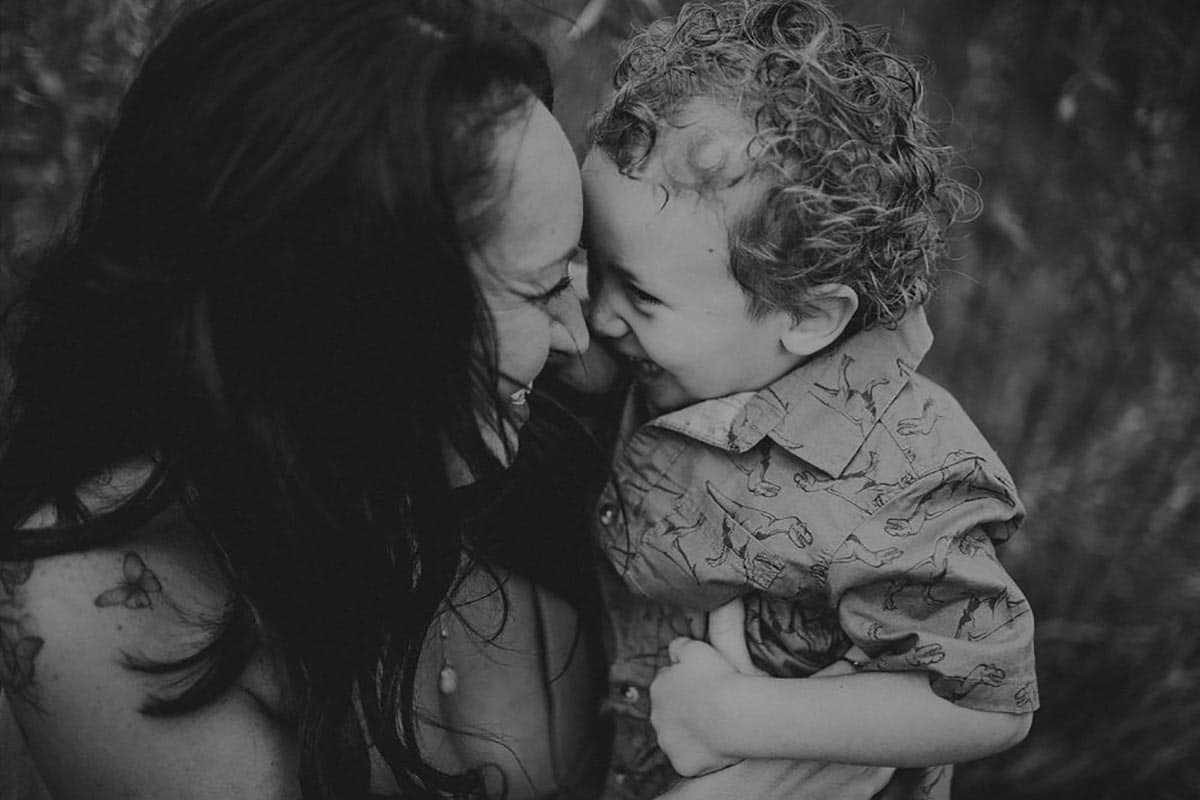 Black and White Image Mother Son Nose to Nose