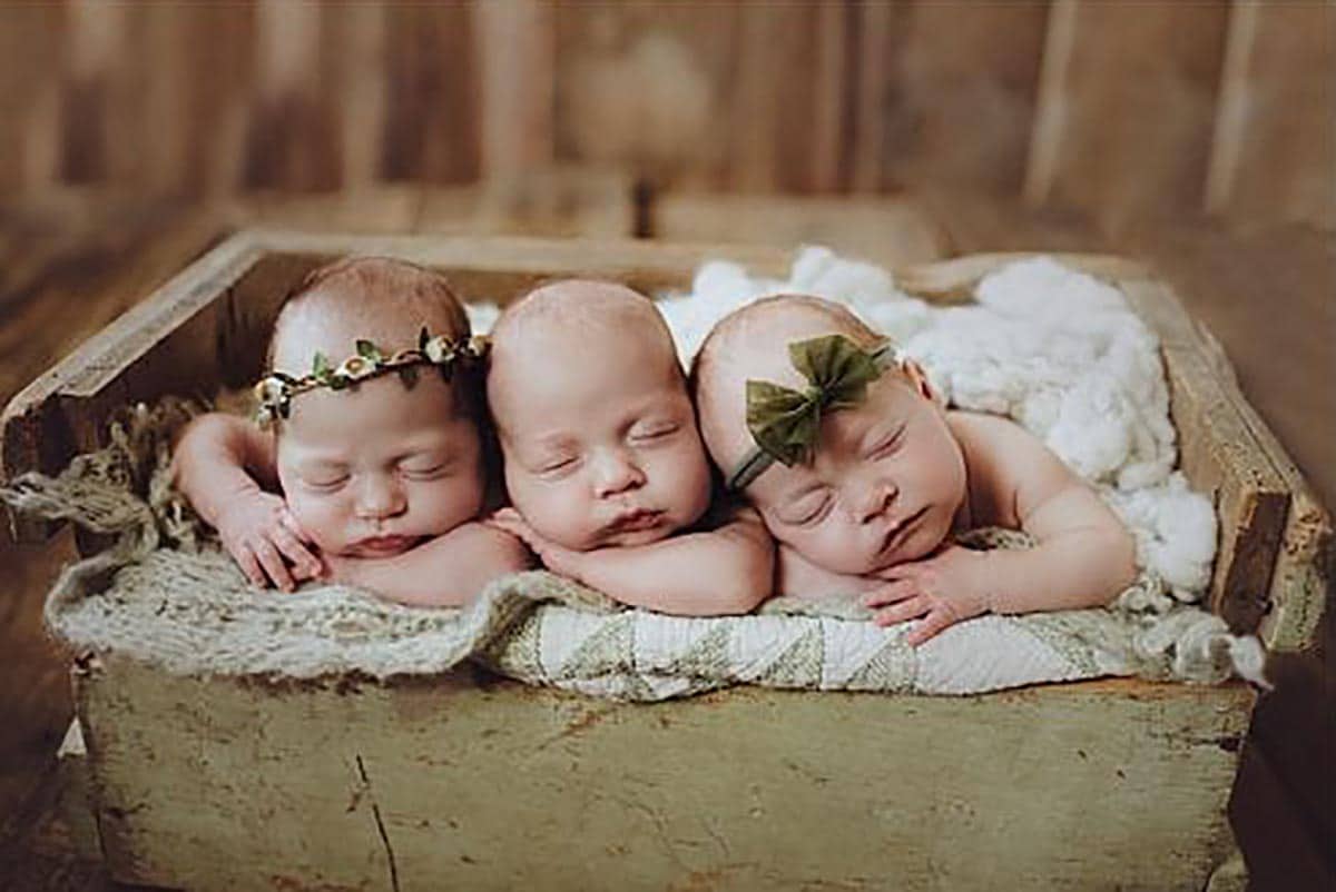 Newborn Triplets Snuggled