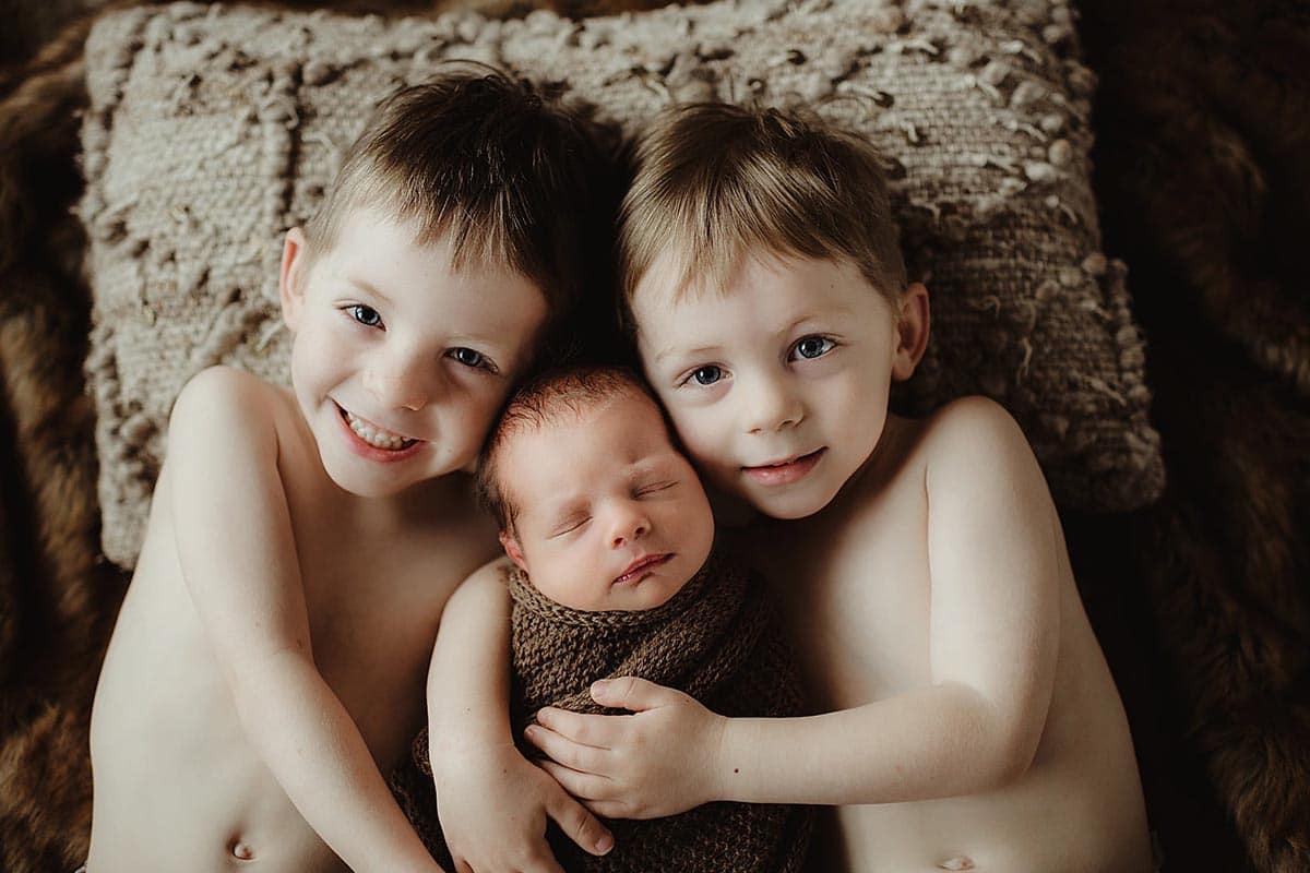 Newborn With Brothers
