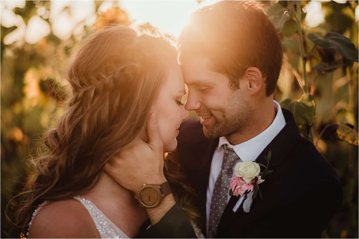 Groom Holding Bride's Face