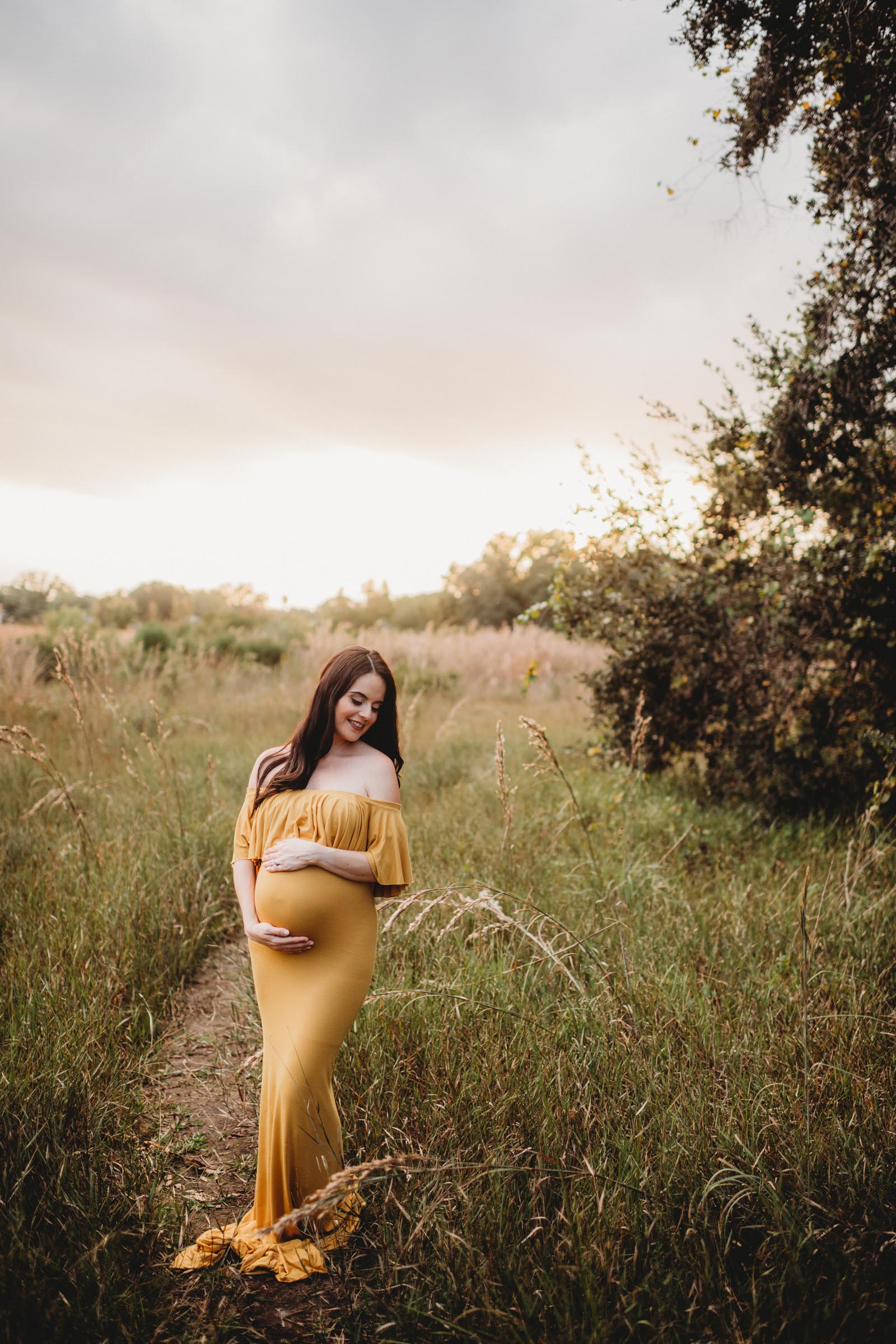 Pregnant Woman Yellow Dress in Field