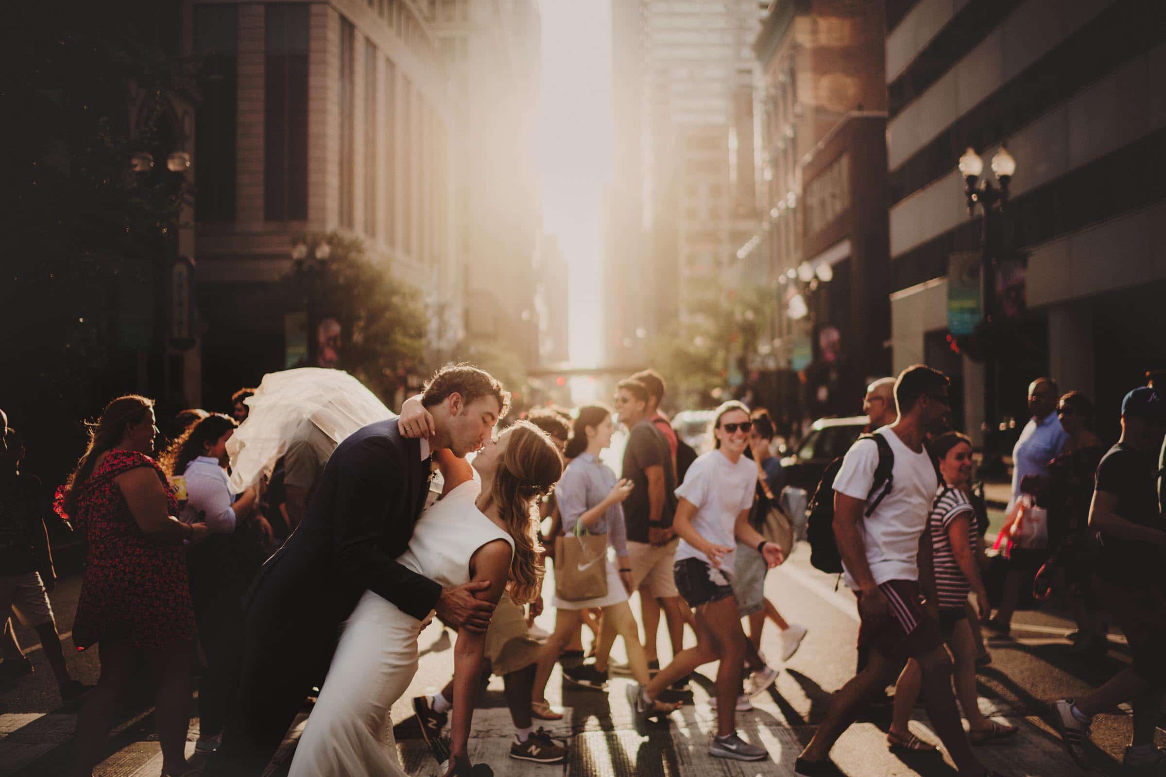 Bride Groom Kissing on Busy Street