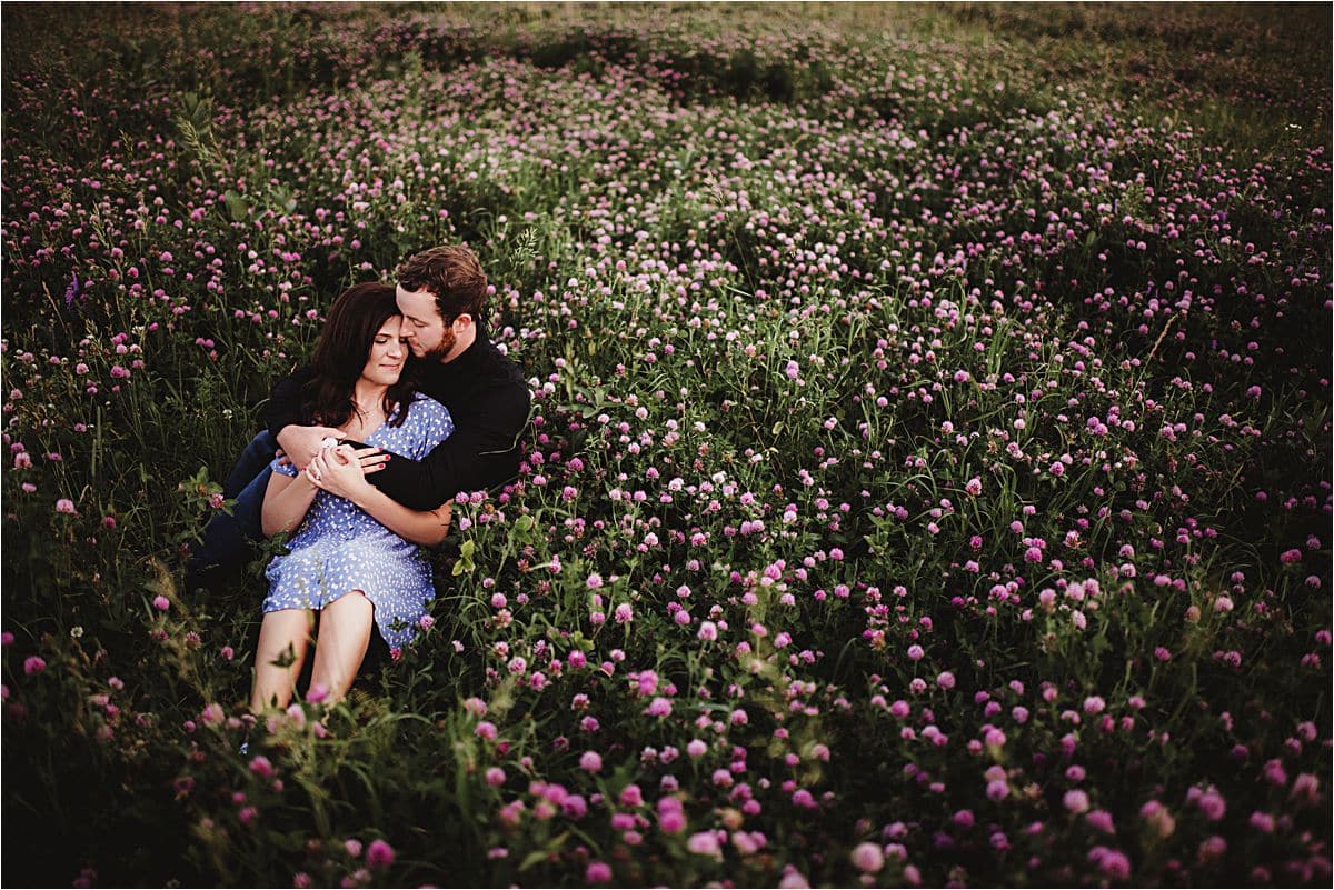 Couple Laying in Wildflower Field