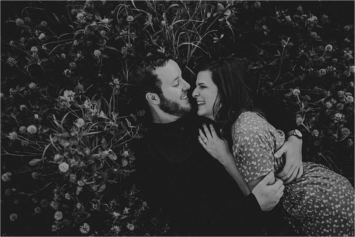 Wildflower Engagement Session Couple Snuggling Laughing