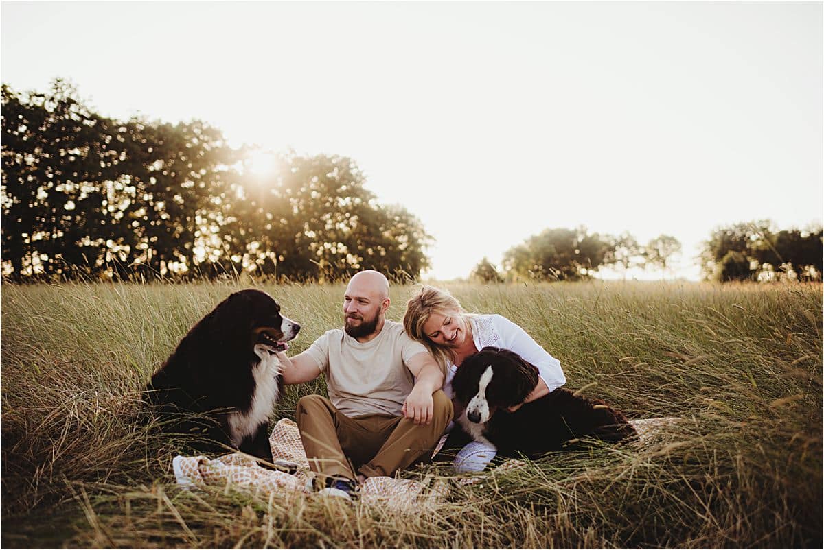 Sunset Portrait Session with Pets Couple with Dogs