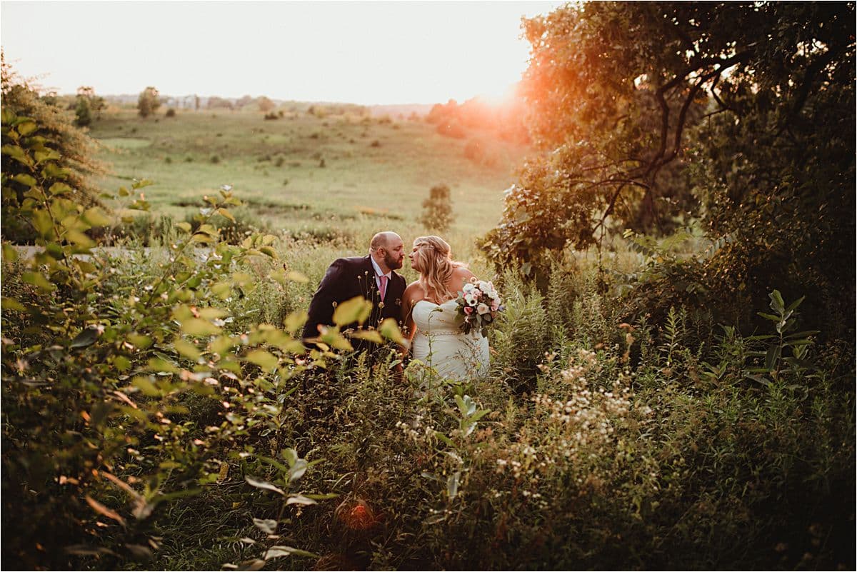 Couple in Field at Sunset