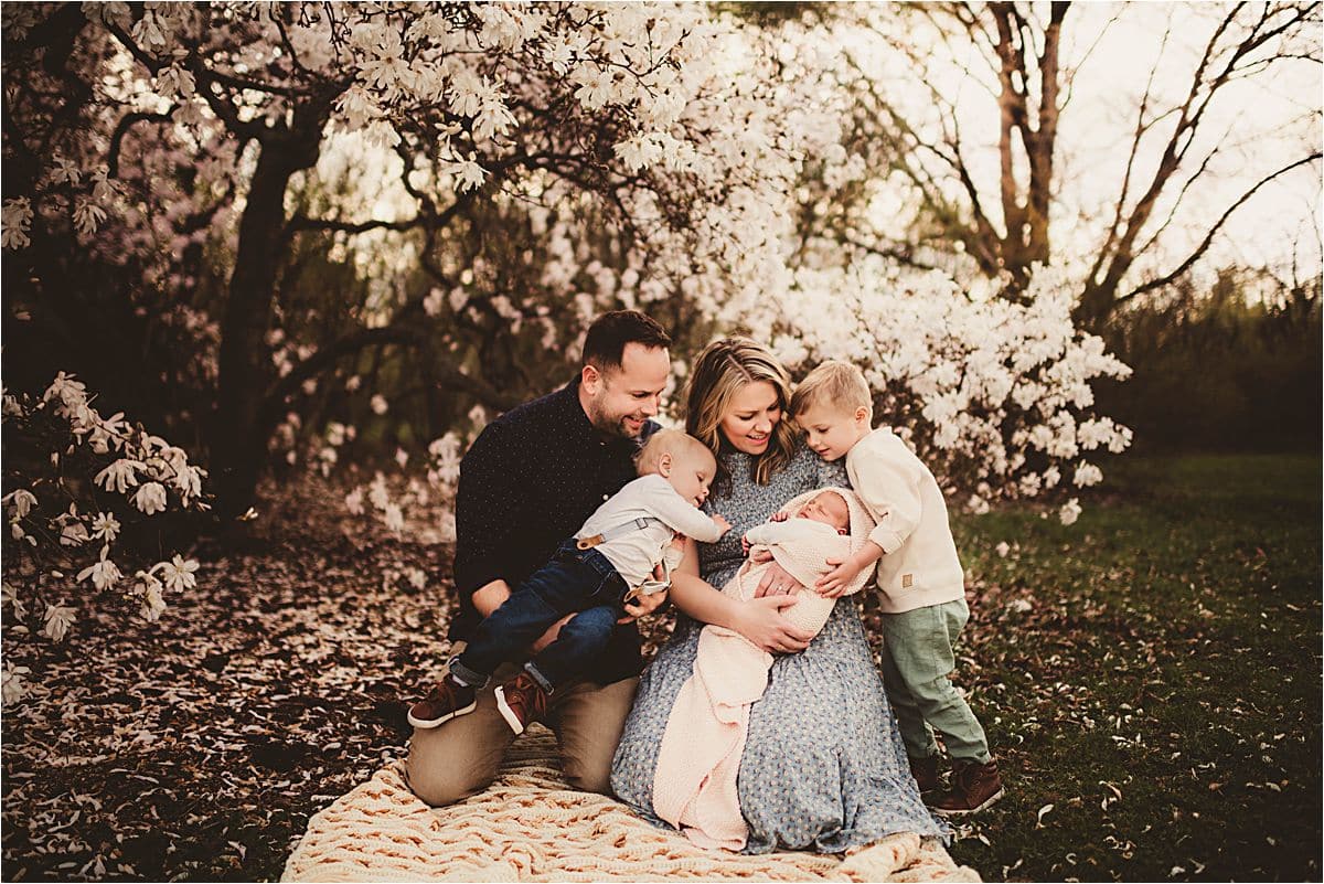 Family with Newborn in Blooms