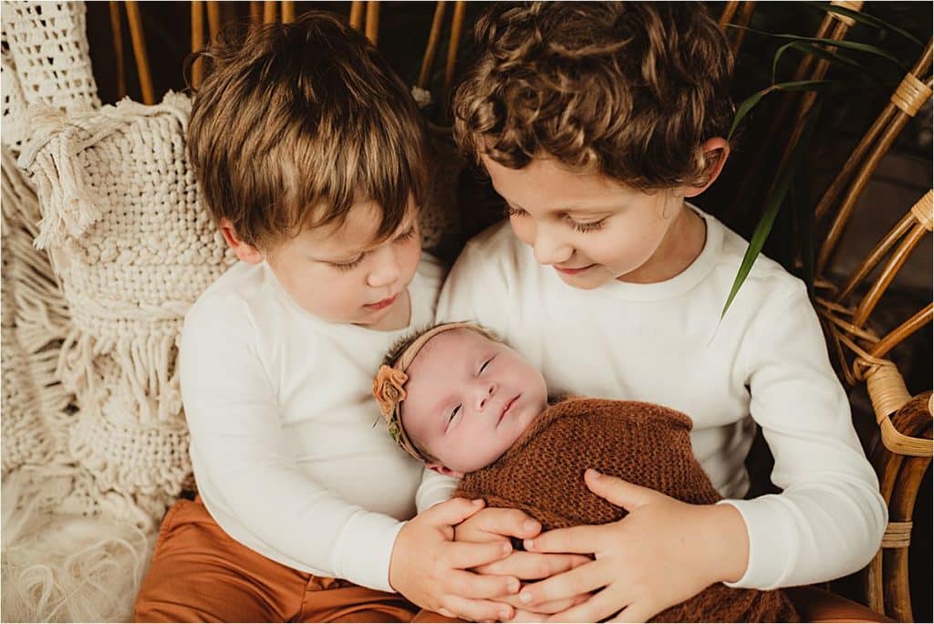 Newborn Girl with Brothers
