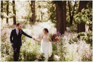 Romantic Spring Woods Wedding Bride Groom Holding Hands 