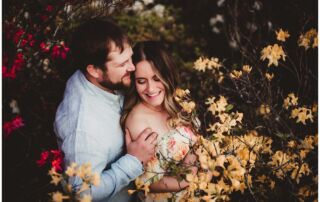 Couple Snuggling in Flowers
