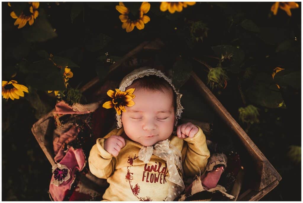 Baby in Wildflower Onesie