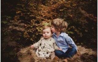 Brother Kissing Sister's Forehead