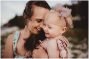 Australian Family Photography Mom Snuggling Daughter