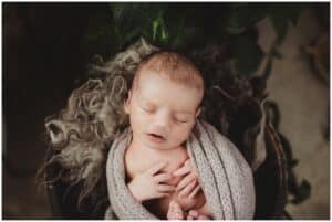 Wisconsin Newborn Portraits Newborn in Wrap