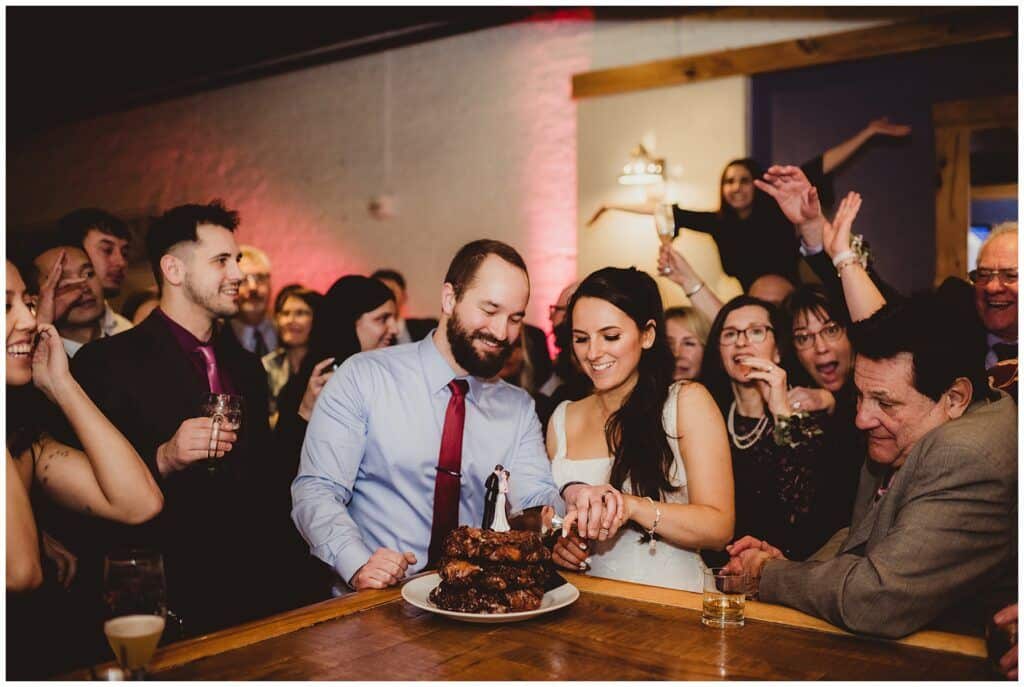 Downtown Madison Wedding Photographs Cake Cutting