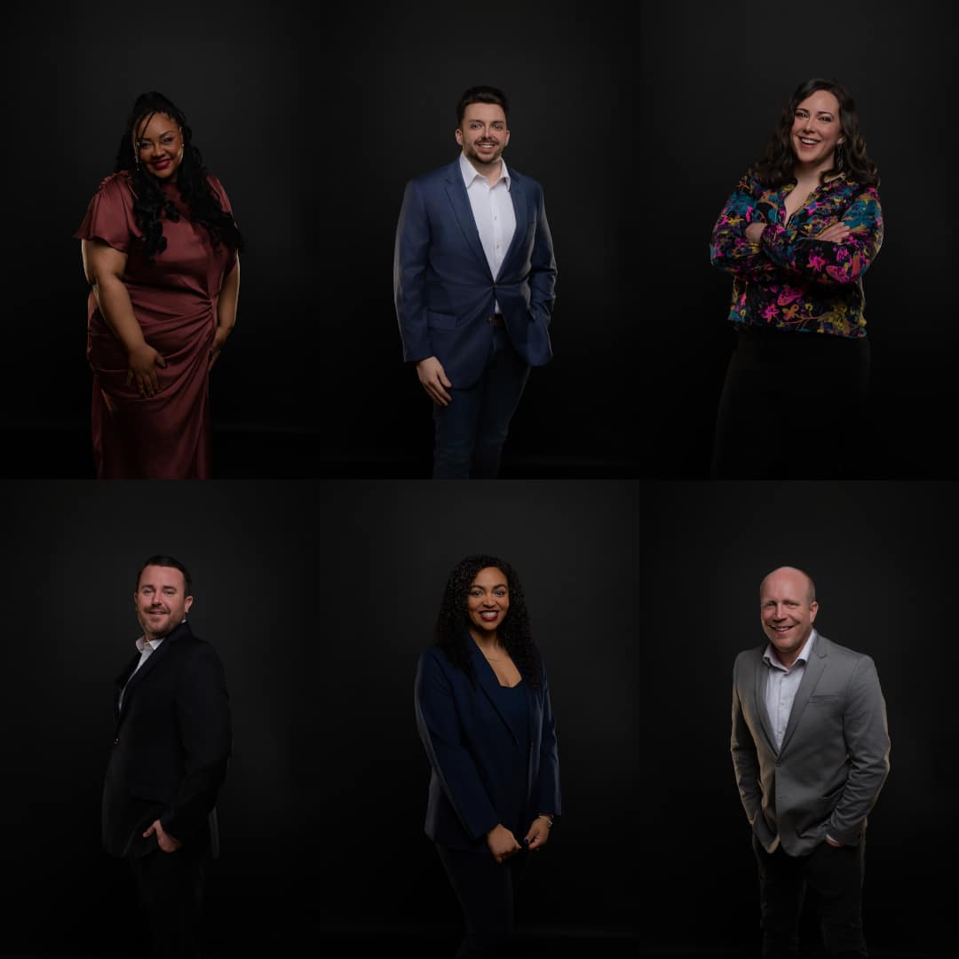 professional_portrait_collage_six_individuals Six diverse professional individuals posing against a dark background, each wearing business attire.